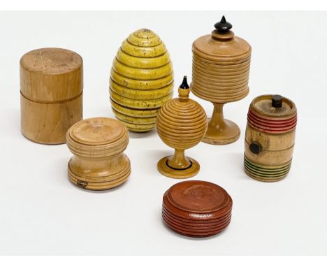 A good collection of 19th and Early 20th Century treen ware. A 19th Century beehive magic trick cup and ball etc