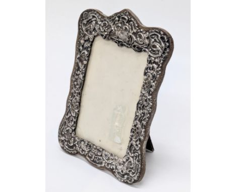 A Late 19th Century / Early 20th Century silver frame with oak back. 15x21cm