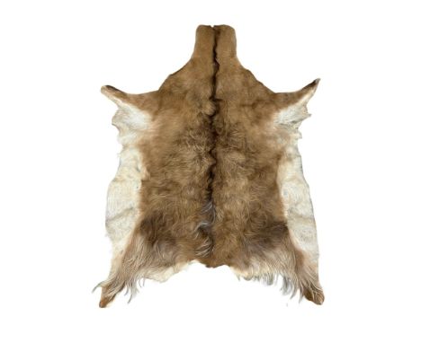 A vintage goats hide throw. 92x120cm