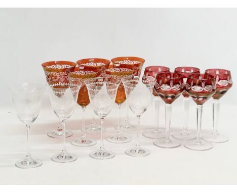 3 sets of vintage wine glasses. A set of 5 Bohemian ruby hock glasses 21cm. A set of 5 Venetian style etched ruby wine glasse