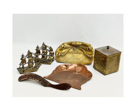 A collection of 19th and Early 20th Century brass and copper. A pair of Victorian brass sailing ship bookends. Art Nouveau cr