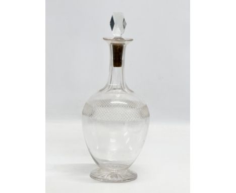 An Edwardian crystal decanter. 29cm