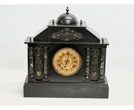 A large Late 19th Century American slate mantle clock. With marble pillars, brass mounts and face. Ansonia Clock Company. 45.