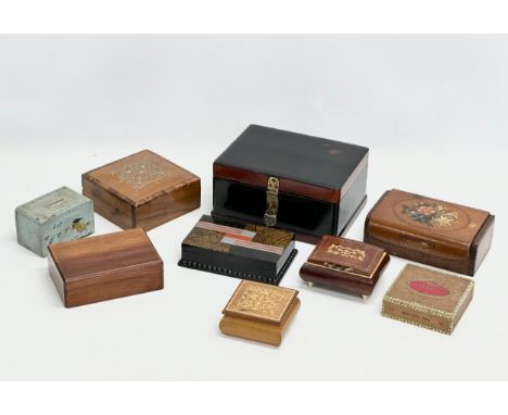 A collection of stationary boxes/trinket boxes
