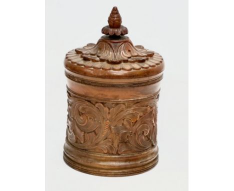 Ole Olsen Moene (1839-1908) A 19th Century Norwegian carved butternut tobacco jar with cover. Attributed to  Ole Olsen Moene.