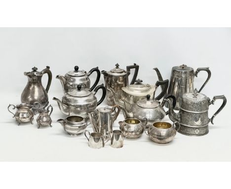 A collection of 19th and Early 20th Century silver plated tea services, teapots etc.