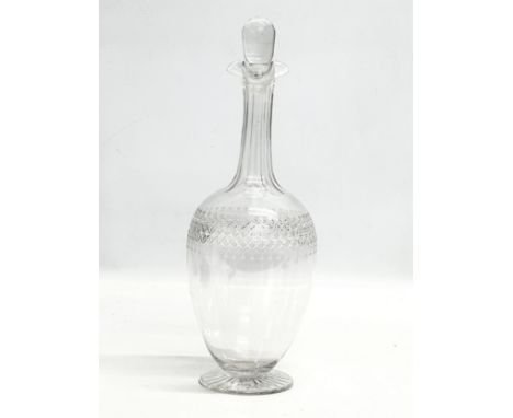 A fine quality 19th Century etched and star cut decanter. Mid/Late 19th Century. 29cm