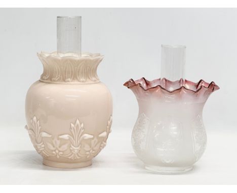 Two Late 19th Century Victorian glass lamp shades and funnels. An opaline glass shade 18x23cm. An etched glass shade with rip