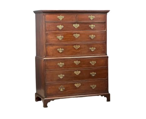 A large Late 18th Century George III mahogany chest on chest, with original brass drop handles and bracket feet. Chest of dra