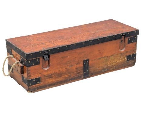 A Late 19th Century metal bound pine trunk. 103x38x32cm