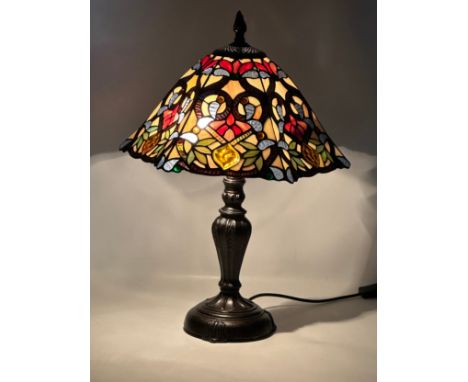 A large Tiffany style table lamp. 39x55cm