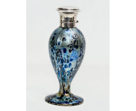 Isle of Wight Glass. A silver mounted iridescent glass perfume bottle. Attributed to Timothy Harris. 2004, Sheffield. 17cm