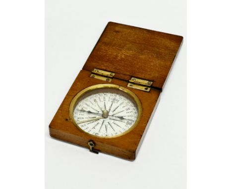 An Early/Mid 19th Century travelling compass.