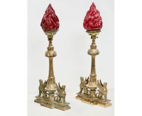 A pair of large good quality Early 20th Century Regency Empire style brass table lamps. With 4 female winged sphinxes on a ra