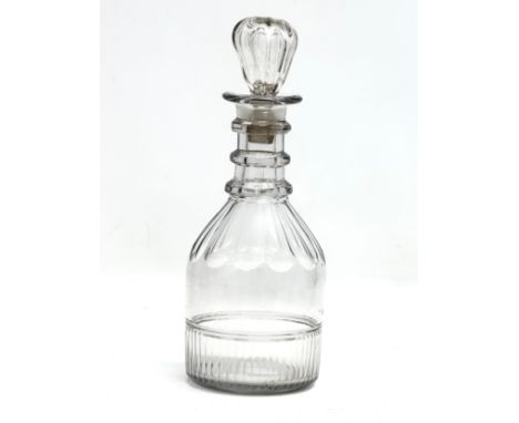 An Early 19th Century Georgian glass decanter. 29cm