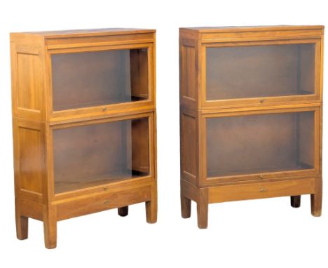Globe-Wernicke. A pair of Mid Century teak stacking bookcases. 84x34x122.5cm