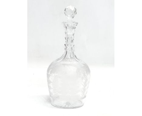 A 19th Century Victorian etched glass decanter. 25cm