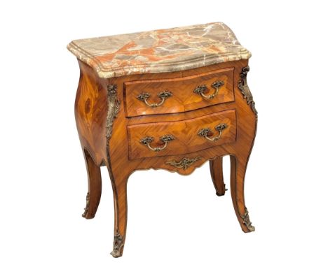 A vintage 18th Century style French Kingwood bombe chest with brass ormolu mounts, marble top and serpentine front. 57x33x66c