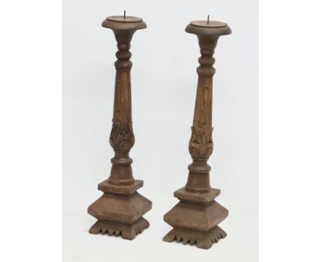 A pair of large vintage carved birch candlesticks. 59cm