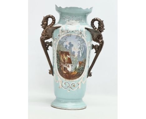 A large Early/Mid 19th Century French Paris Porcelain hand painted twin dragon handled vase. 32x51cm