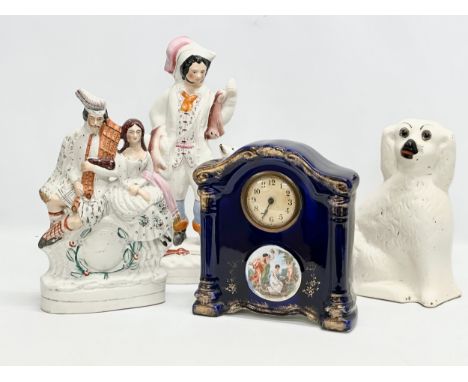 19th Century Victorian Staffordshire figures and an Early 20th Century Royal Vienna style mantle clock. A Staffordshire Hunte