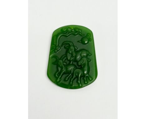 A Chinese jade 3 goat pendant. 5cm