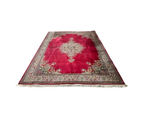 A very large Persian style rug. 365x476cm