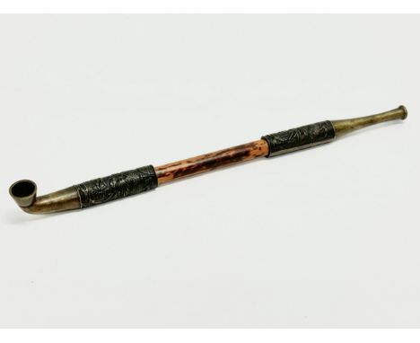 A Japanese Late Meiji Period bamboo and embossed bronze opium pipe. 20.5cm