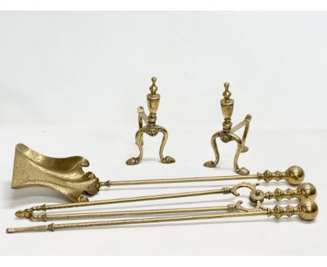 Early 20th Century Art Nouveau brass fire andirons and tools.