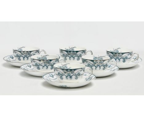 A. J. Wilkinson. An Edwardian period “Iris” and “Lighfield” 12 piece tea service. Royal Staffordshire Pottery. Iris cups and 