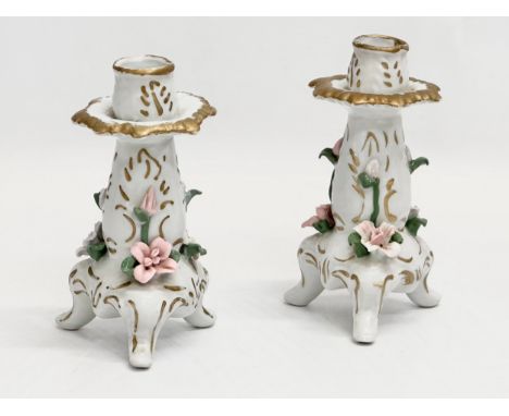 A pair of Early 20th Century Dresden style flower encrusted porcelain candlesticks. Circa 1900-1920. 14cm