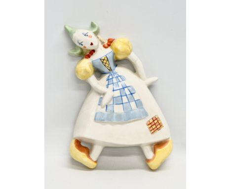 Crown Devon “European Countries of the World Series” An Art Deco “Dutch Girl” wall plaque. 26cm