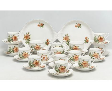 A 42 piece Royal Albert tea service. 2 cake plates, 2 milk jugs, 2 sugar bowls, 12 sandwich plates, 12 tea cups, 12 saucers.