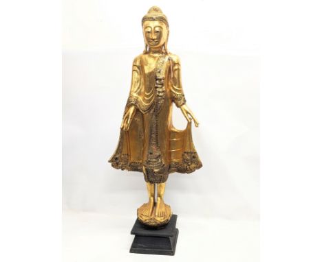 A large gilded Burmese Buddha statue. 114cm