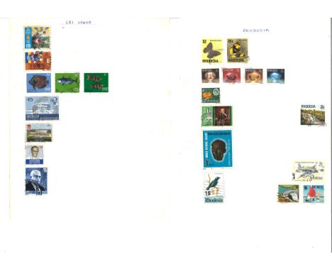 British commonwealth stamp collection on 27 loose album pages. Letters R-z. Includes South Africa, Tonga, Trinidad and Tobago