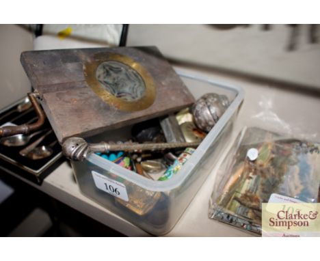 A box containing a white metal storage jar, lighter, pocket watch case, cloisonné jar and cover etc.