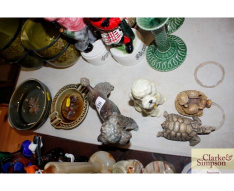 A Goebel dog; a Sylvac dog; two tortoise ornaments; glazed ash tray; and a glazed bowl