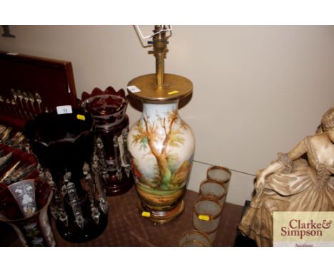 A continental lamp, lacking shade and lead