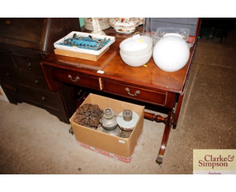 A mahogany sofa table