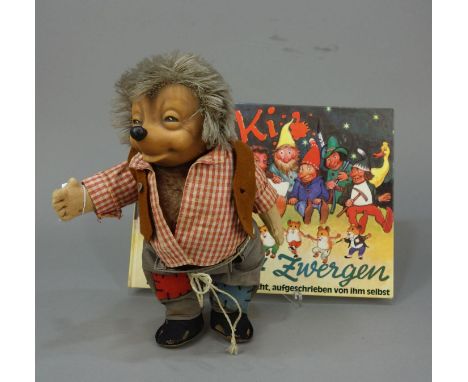 MECKI, Manufaktur Steiff, 1950er Jahre, mit originaler Bekleidung Modell-Nr. 8728,7, H. ca. 26 cm (bespielter Zustand). Dabei