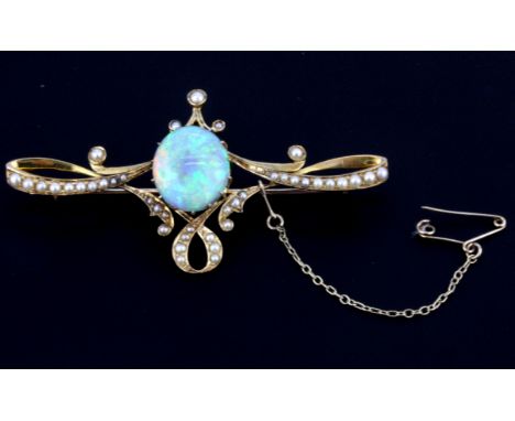 A yellow metal (tested high carat gold) brooch set with a cabochon cut opal and split pearls, approx. 6.3ct opal L. 7cm.