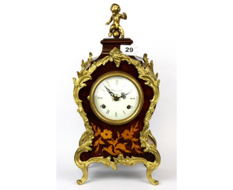 A French ormolu mounted inlaid striking mantle clock, H. 37cm.