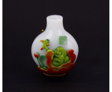 An unusual Chinese four layer Peking carved cameo glass snuff bottle, with signature panel, H. 6cm.