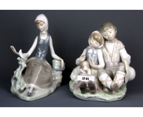 Two Lladro figures of children, H. 16cm.