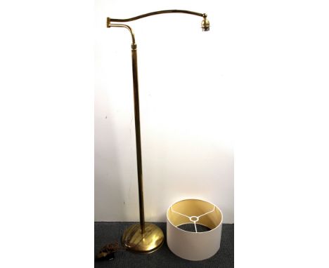 A gilt brass standard reading lamp and shade, H. 145cm. (adjustable upwards)