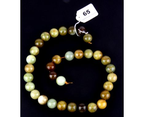 A strand of large mixed colour jade beads, bead Dia. 20mm.