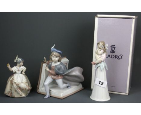 Three Lladro porcelain figurines, tallest H. 18.5cm.