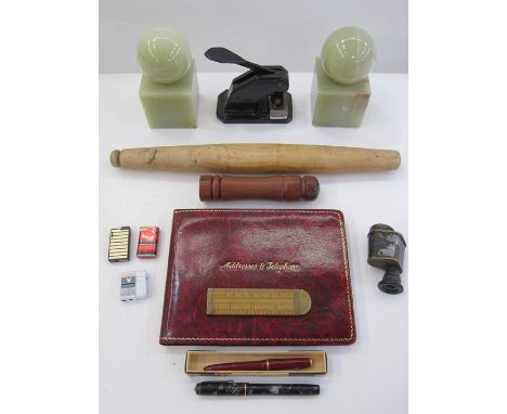 Green onyx book ends, a vintage cast iron paper letter embosser, red leather address and telephone book, assorted lighters, a