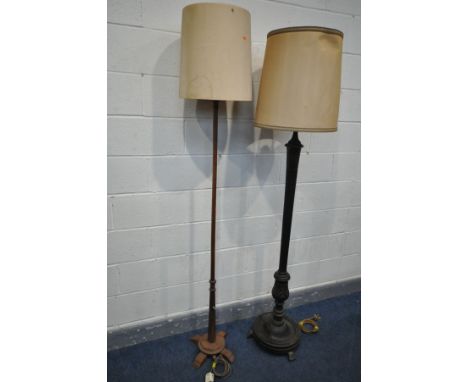AN EARLY 20TH CENTURY ARTS AND CRAFTS STANDARD LAMP, with a thin octagonal upright and a shade, height to fitting 169cm and a