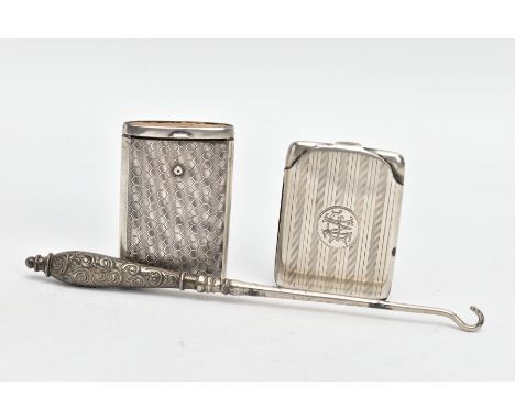 TWO SILVER VESTAS AND A SILVER HANDLED BUTTON HOOK, the first vesta of a rectangular form, engine turned design with an engra